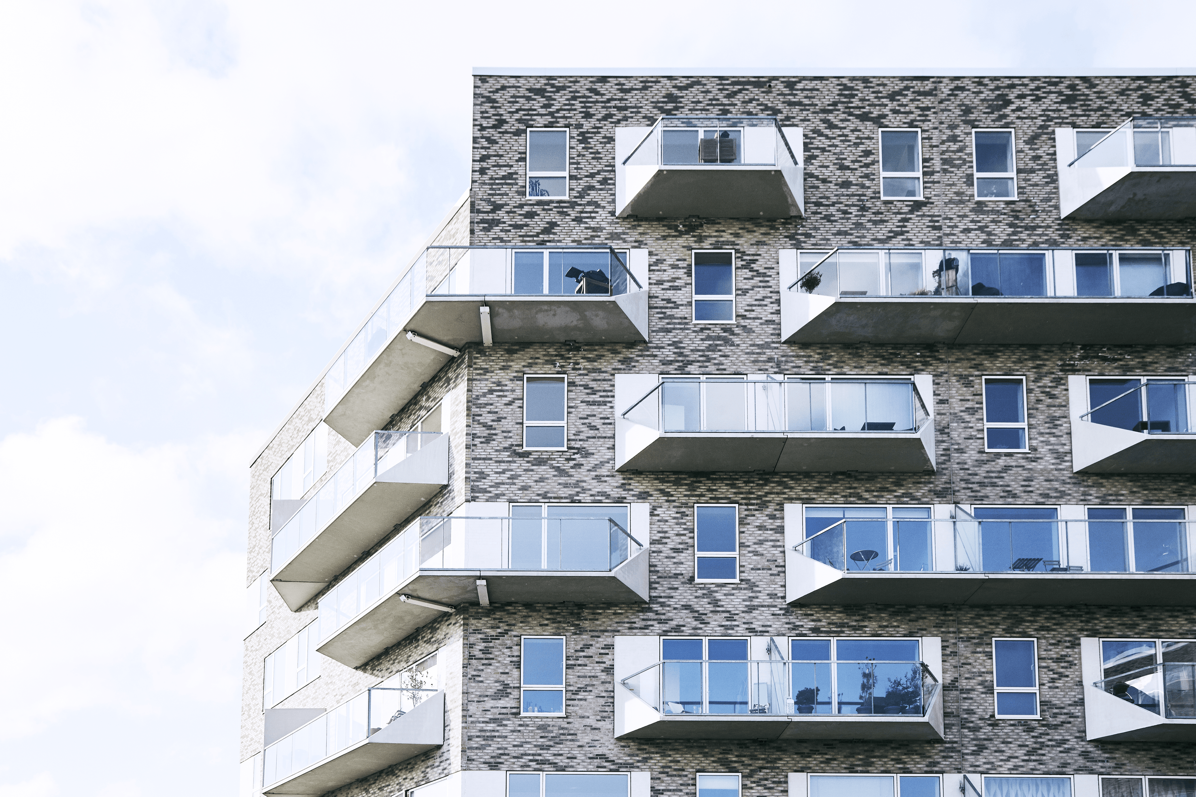 Exterior view of Skibbroen showing balconies on the building façade.