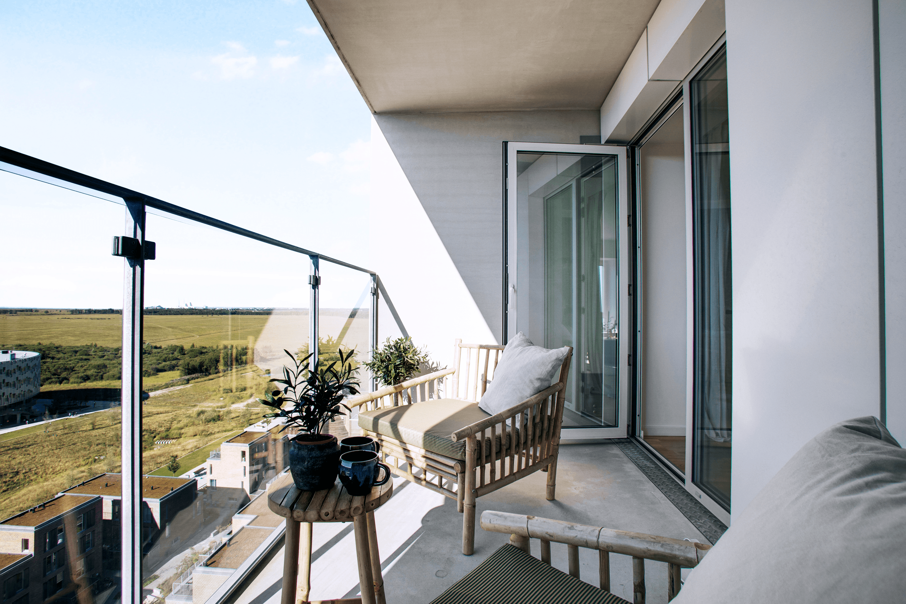 Interior view from inside looking out toward the balcony at Fælledudsigten