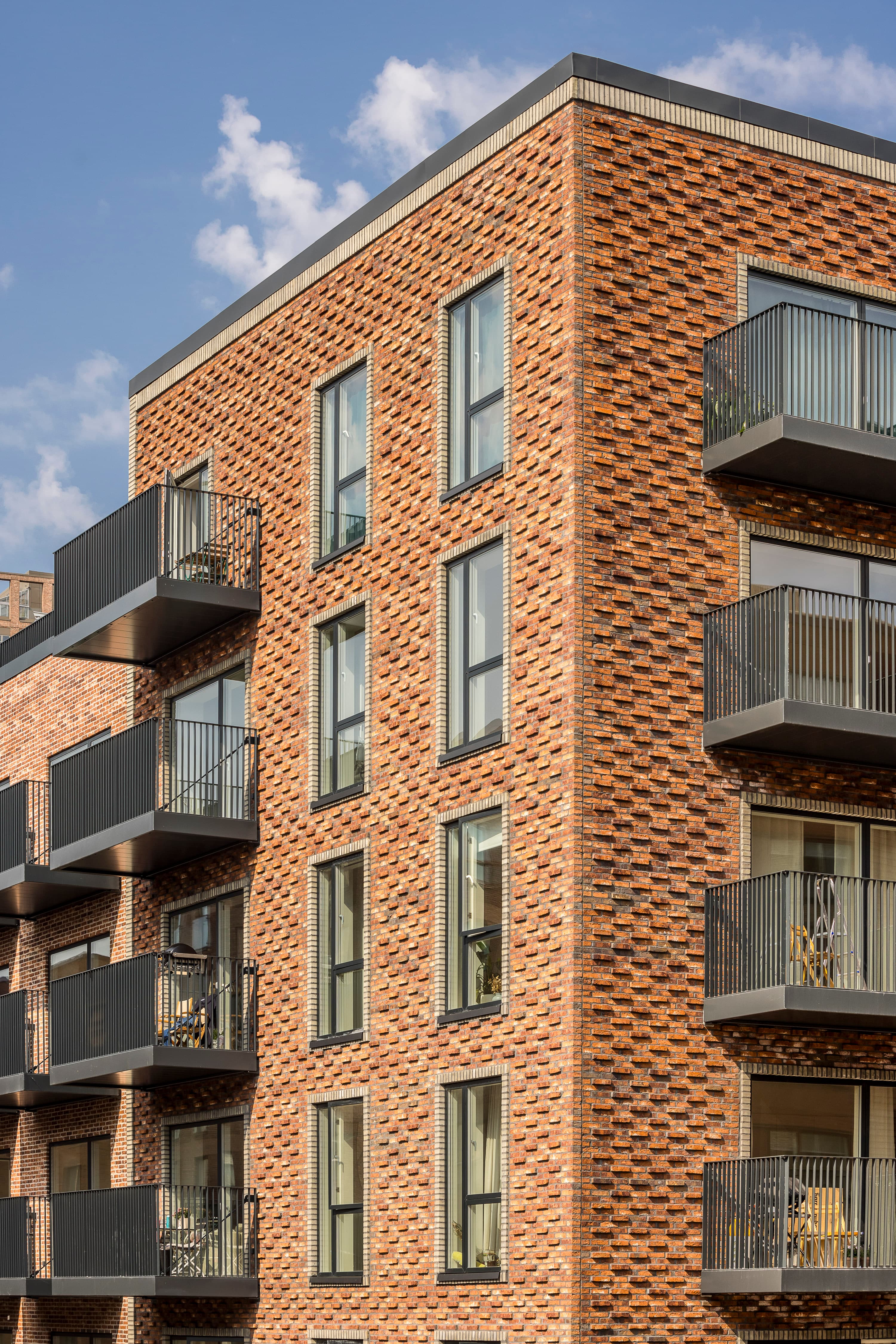 Facade and balcony at the Torveporten property in Valby